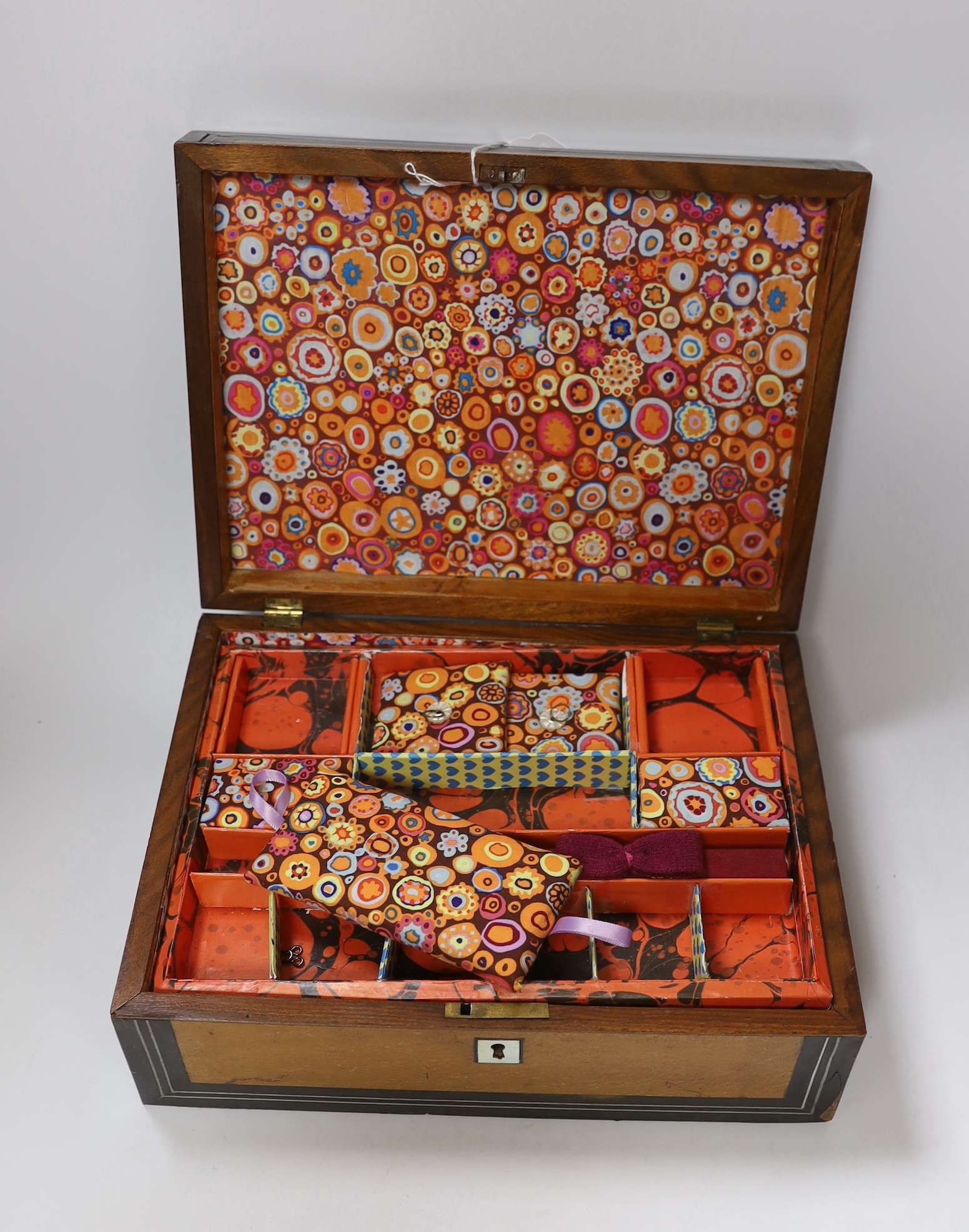 A mid 19th century London plane and ebony veneered sewing box, mother of pearl inlay, 31cm